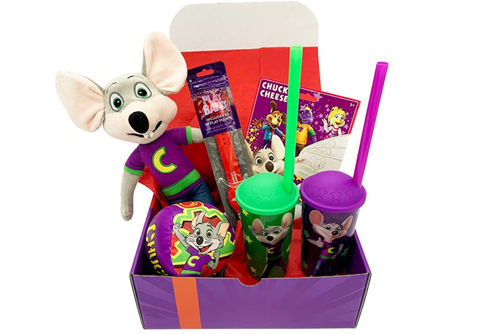 Chuckie cheese gift box featuring a ball, a stuffed Chuck E. doll, commemorative cups and play band