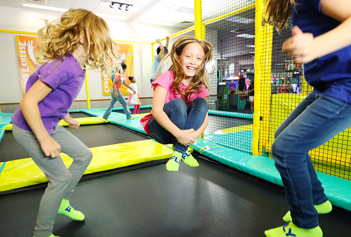 Kids jumping in trampoline zone