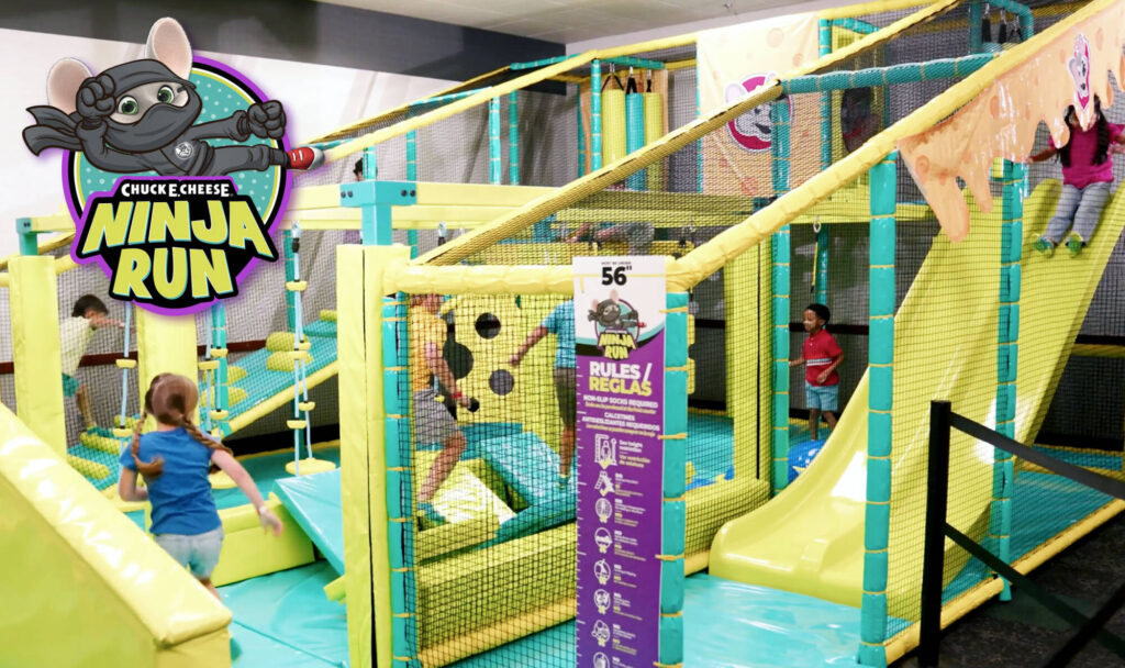 kids playing on chuck e. cheese ninja run adventure zone
