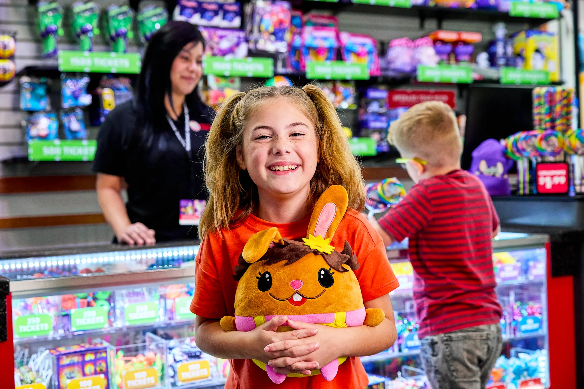 Girl holding a prize.