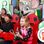 Children enjoying an arcade game.