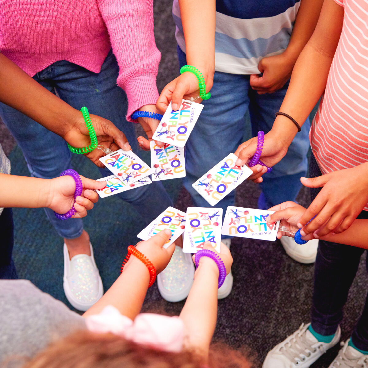 Kids enjoying unlimited play with the Chuck E. Cheese Summer Fun Pass