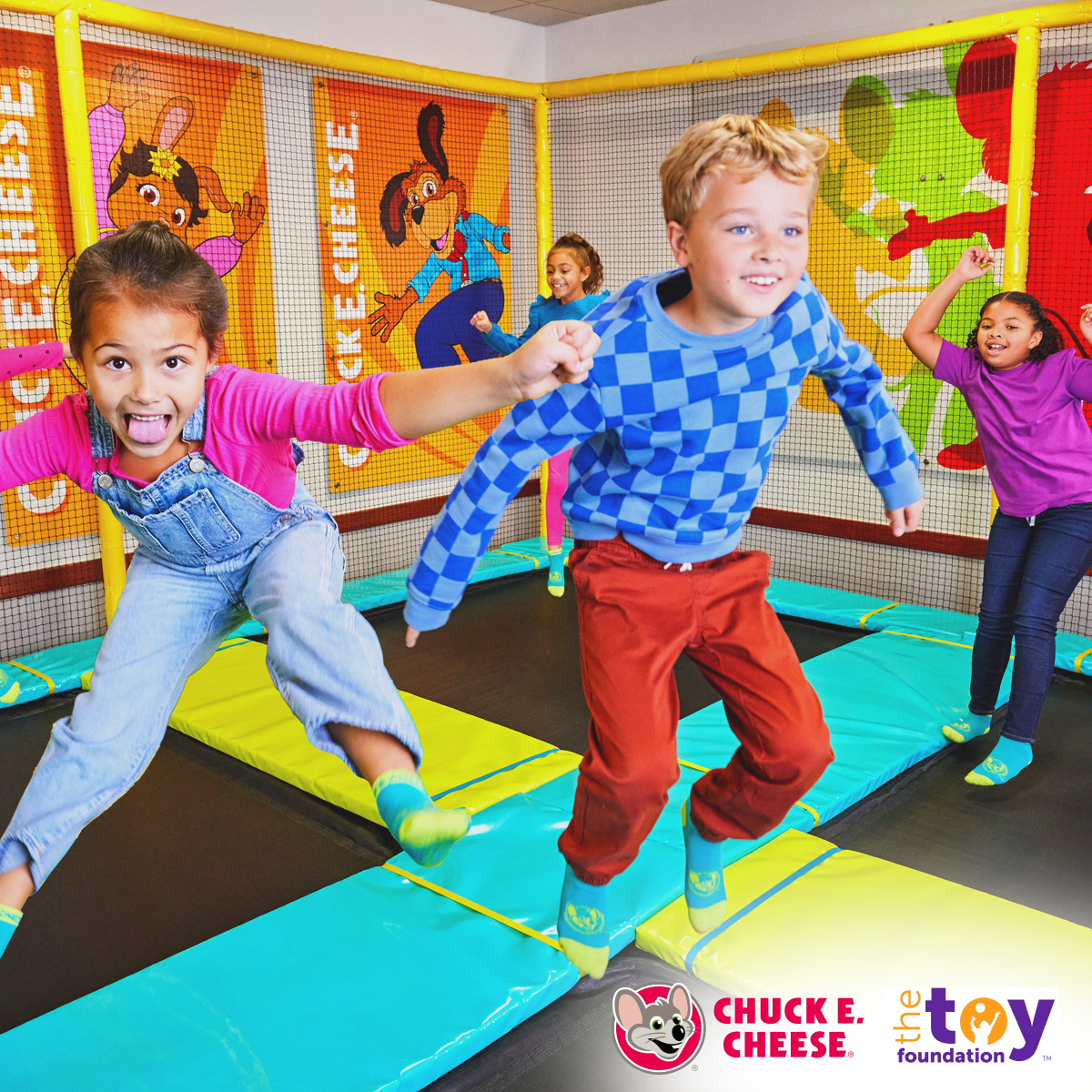 Kids and families celebrating International Day of Play at Chuck E. Cheese with The Toy Foundation™.