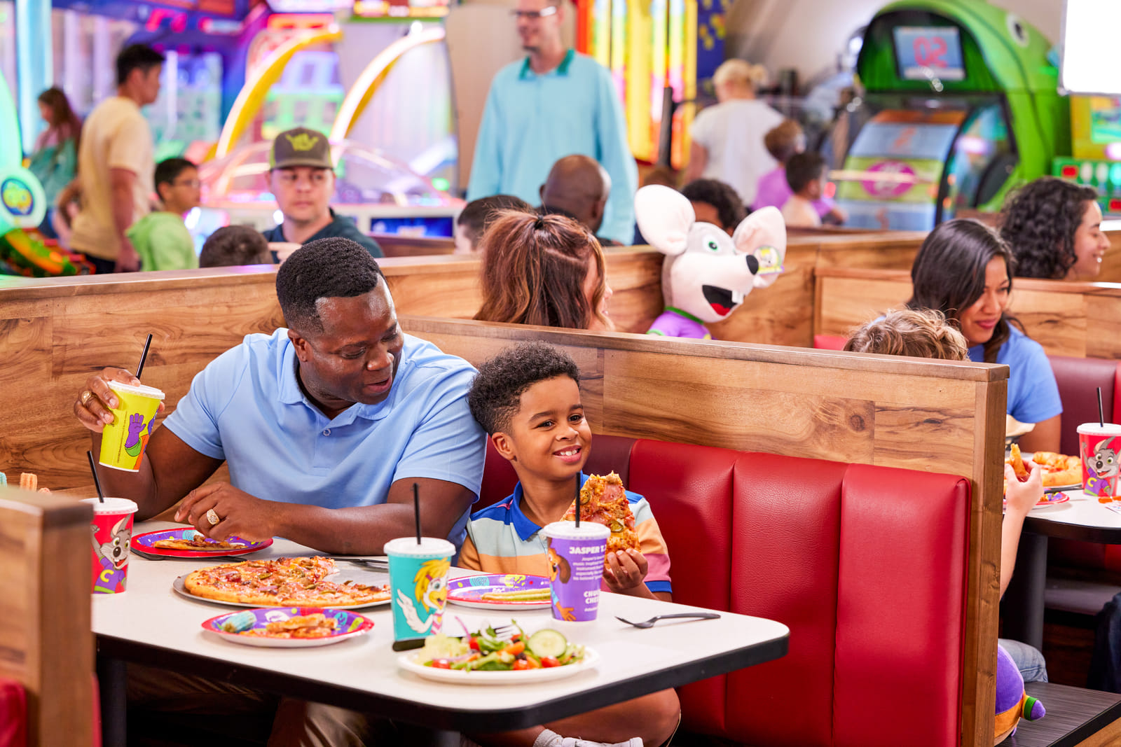 Families enjoying the food and pizza